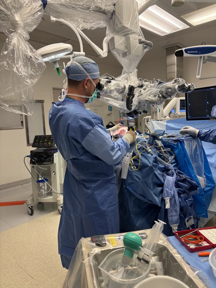 Dr. Evan Winograd, MD performing neurosurgery